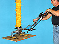 Vacuum Tube Lifter with Extended Length Handle and Compressed Air Powered Release and Lift Valve