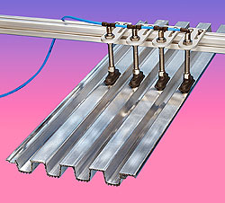 Corrugated Sheet Handling System - Vacuum Cups Eliminate Mechanical Grabs