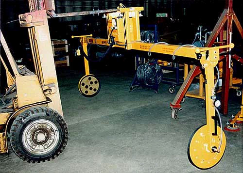 ANVER Two Pad Electric Powered Side Gripping Vacuum Lifter with Fork Lift Frame for Lifting Enclosures 15 ft x 6 ft x 3 ft (4.6 m x 1.8 m x 1.0 m) weighing up to 1500 lb (680 kg)