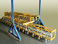 ANVER Electric Powered Vacuum Lifter with an overall length of 108 feet (42.5 m) and a total of 160 Vacuum Pad Suspensions  for Lifting Extra Long Very Porous Loads weighing up to 7000 lb (3180 kg)
