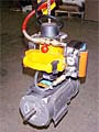 VM Vacuum-Hoist Lifting System with a Vacuum Pad Attachment for Lifting Objects that have a Curved Surface