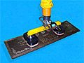 Vacuum Tube Lifter with Dual Foam Seal Vacuum Pad Attachments for Attaching to Uneven Surfaces