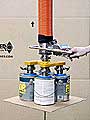 Lifting and Packaging Four One-Gallon Paint Cans with Slip Sheets at the Same Time